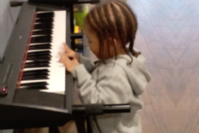 a child playing piano